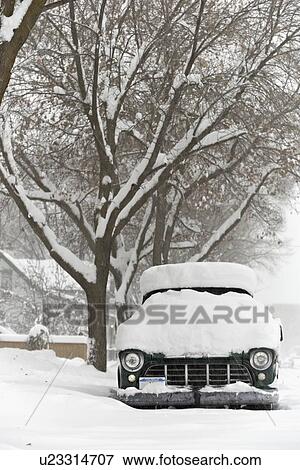 Snow covered car View Large Photo Image Stock Photo - Snow covered car. Fotosearch