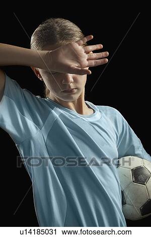 Soccer player and ball View Large Photo Image Stock Image - Soccer player and ball. Fotosearch