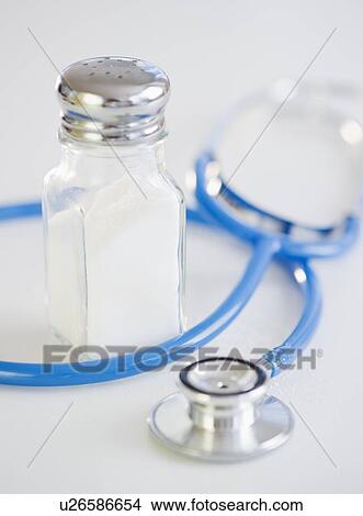Picture - Stethoscope and salt shaker. Fotosearch