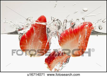 Stock Image - Strawberries in water. Fotosearch