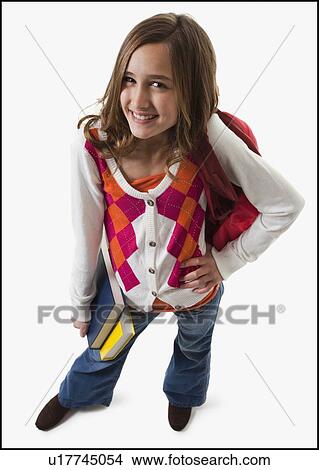 Student carrying books View Large Photo Image Picture - Student carrying books. Fotosearch