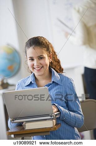 Student in classroom View Large Photo Image Stock Image - Student in classroom. Fotosearch