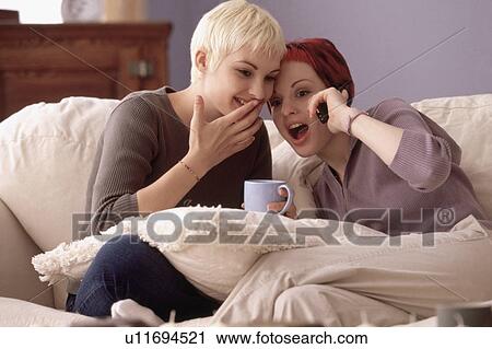 Surprised woman laughing together View Large Photo Image Stock Image - Surprised woman laughing together. Fotosearch