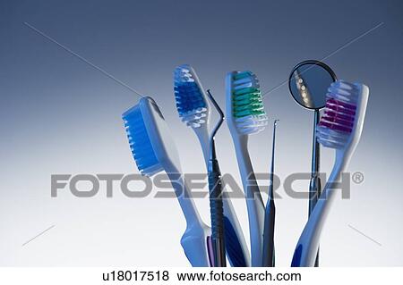 Toothbrushes and dental instruments View Large Photo Image Stock Photo - Toothbrushes and dental instruments. Fotosearch