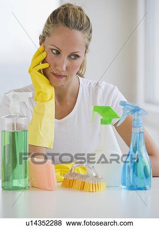 Woman and cleaning supplies View Large Photo Image Stock Photo - Woman and cleaning supplies. Fotosearch