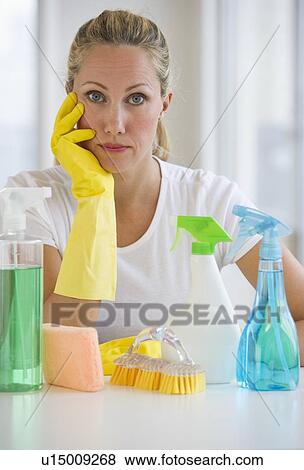 Woman and cleaning supplies View Large Photo Image Stock Photo - Woman and cleaning supplies. Fotosearch