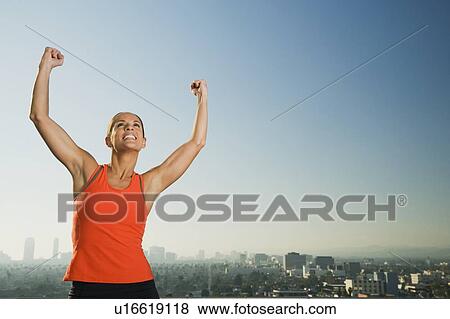 Woman flexing her muscles View Large Photo Image Stock Photo - Woman flexing her muscles. Fotosearch