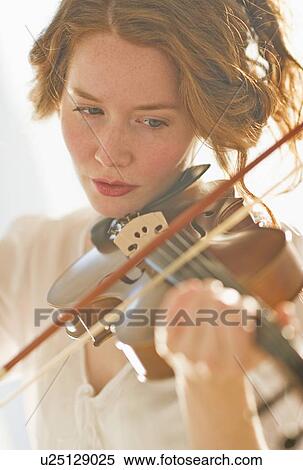 Woman playing violin View Large Photo Image Stock Photography - Woman playing violin. Fotosearch