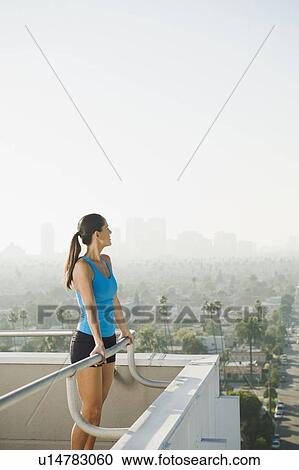 Woman resting after exercising View Large Photo Image Stock Image - Woman resting after exercising. Fotosearch