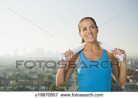 Woman resting after exercising View Large Photo Image Stock Photo - Woman resting after exercising. Fotosearch
