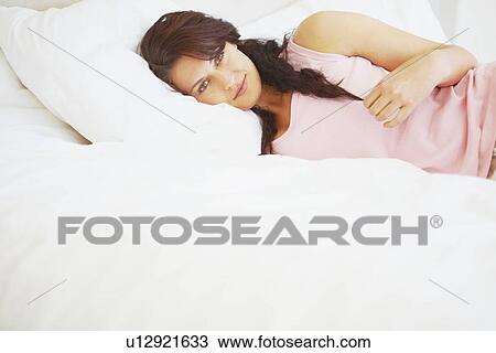 Stock Image - Woman resting. Fotosearch