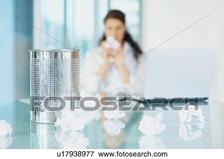 Woman throwing crumpled paper View Large Photo Image Stock Photo - Woman throwing crumpled paper. Fotosearch