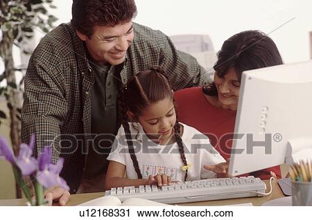 Young girl learning to use a computer View Large Photo Image Stock Image - Young girl learning to use a computer. Fotosearch