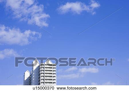 Apartment building under sky, copy space, Nishinomiya city, Hyogo prefecture, Japan View Large Photo Image Stock Image - Apartment building under sky, copy space, Nishinomiya city, Hyogo prefecture, Japan. Fotosearch