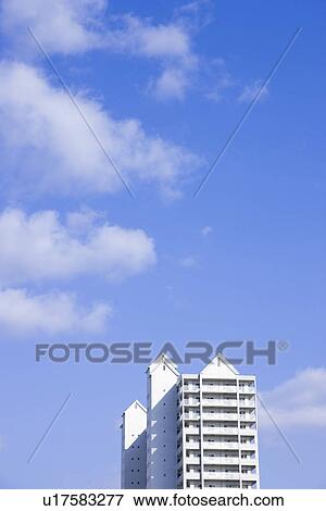 Stock Photo - Apartment building under sky, Nishinomiya city, Hyogo prefecture, Japan. Fotosearch