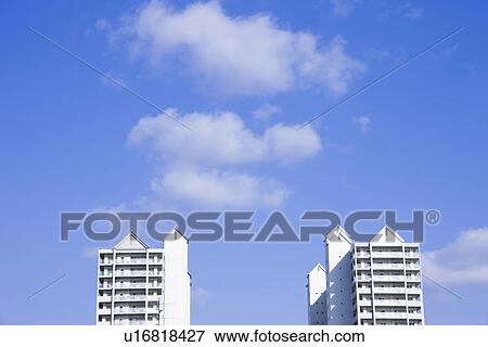 Stock Photo - Apartment buildings under sky, Nishinomiya city, Hyogo prefecture, Japan. Fotosearch