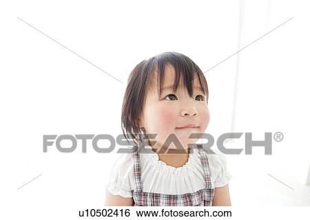 Baby girl, close-up View Large Photo Image Stock Photograph - Baby girl, close-up. Fotosearch