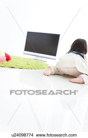 Picture - Baby girl crawling. Fotosearch