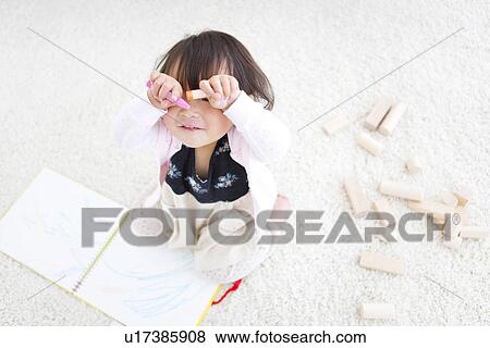 Baby girl holding crayons View Large Photo Image Stock Photo - Baby girl holding crayons. Fotosearch