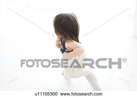Baby girl walking View Large Photo Image Stock Image - Baby girl walking. Fotosearch