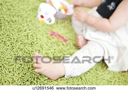 Stock Photograph - Barefoot of baby girl. Fotosearch