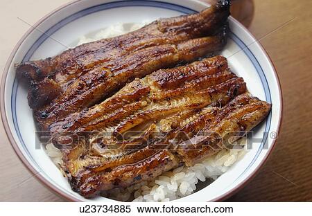 Stock Photography - Bowl of grilled eel on rice, close up. Fotosearch