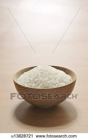 Bowl of raw rice View Large Photo Image Stock Image - Bowl of raw rice. Fotosearch