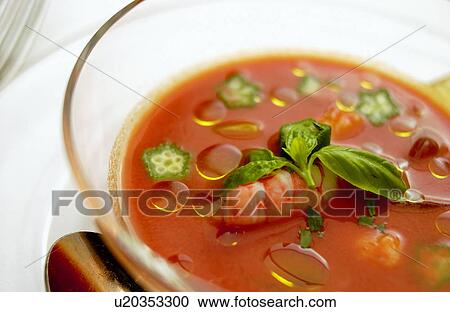 Stock Image - Bowl of shrimp gazpacho, close up. Fotosearch