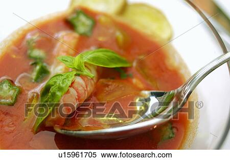 Stock Photography - Bowl of shrimp gazpacho, close up. Fotosearch