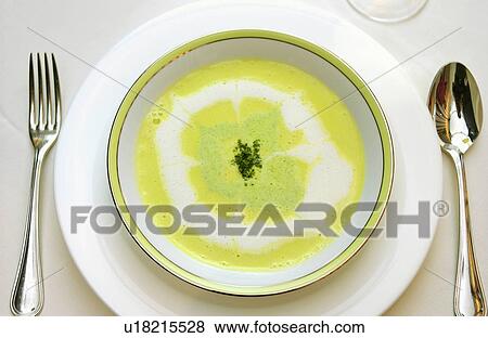 Stock Photo - Bowl of vegetable soup, white background. Fotosearch