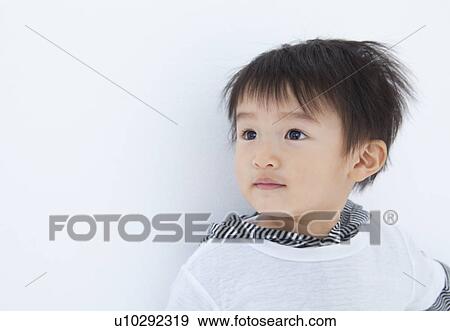 Stock Photo - Boy looking away. Fotosearch