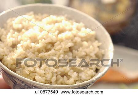 Stock Photo - Brown rice, close-up. Fotosearch