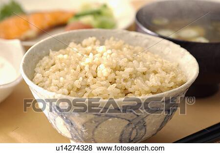Brown rice, close-up View Large Photo Image Stock Photo - Brown rice, close-up. Fotosearch