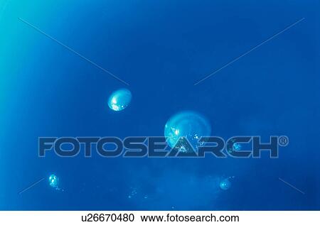 Stock Image - Bubble underwater moving up. Fotosearch
