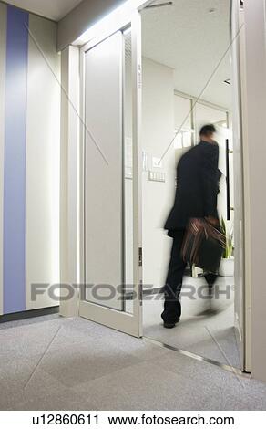 Business Man Getting into Office View Large Photo Image Stock Image - Business Man Getting into Office. Fotosearch