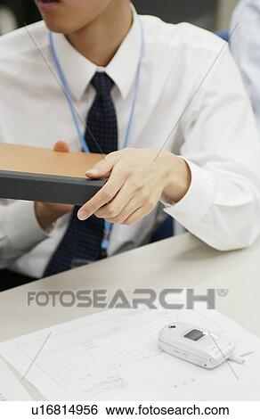 Business Man Holding Document View Large Photo Image Stock Photograph - Business Man Holding Document. Fotosearch