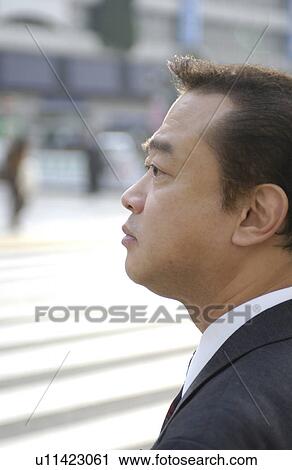 Businessman at street, differential focus, Tokyo prefecture, Japan View Large Photo Image Stock Image - Businessman at street, differential focus, Tokyo prefecture, Japan. Fotosearch