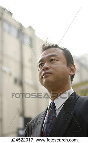 Businessman at street, Tokyo prefecture, Japan View Large Photo Image Stock Photo - Businessman at street, Tokyo prefecture, Japan. Fotosearch
