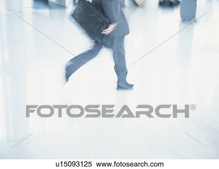 Stock Photography - Businessman running. Fotosearch