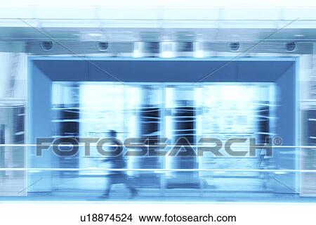 Businessman walking for work, toned image, blurred motion, Tokyo prefecture, Japan View Large Photo Image Picture - Businessman walking for work, toned image, blurred motion, Tokyo prefecture, Japan. Fotosearch