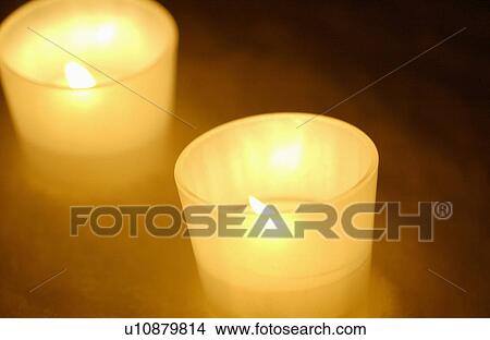 Picture - Candles on snow. Fotosearch