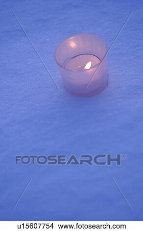 Candles on snow View Large Photo Image Picture - Candles on snow. Fotosearch