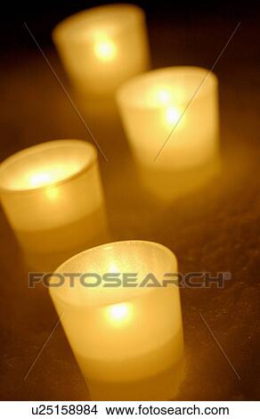 Candles on snow View Large Photo Image Picture - Candles on snow. Fotosearch
