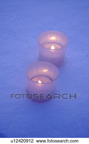 Candles on snow View Large Photo Image Stock Image - Candles on snow. Fotosearch