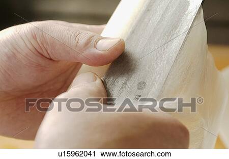 Chef peeling Daikon radish, close up View Large Photo Image Stock Image - Chef peeling Daikon radish, close up. Fotosearch