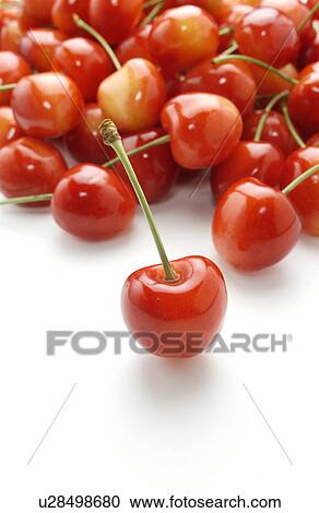 Stock Image - Cherries on white background. Fotosearch