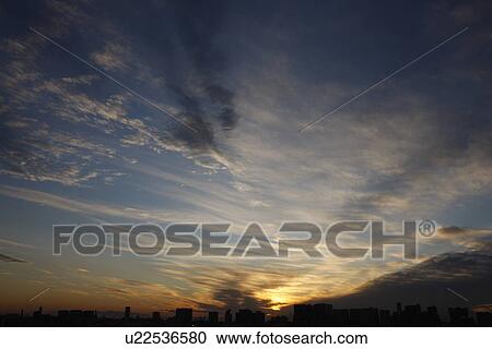 Stock Image - Cityscape at dusk. Fotosearch