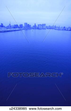 Cityscape beyond Tokyo bay, toned image, copy space, Tokyo prefecture, Japan View Large Photo Image Stock Photography - Cityscape beyond Tokyo bay, toned image, copy space, Tokyo prefecture, Japan. Fotosearch