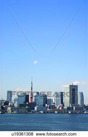 Stock Photo - Cityscape under blue sky, copy space, Tokyo prefecture, Japan. Fotosearch