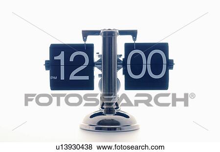 Stock Photo - Clock showing 12 o'clock, white background. Fotosearch